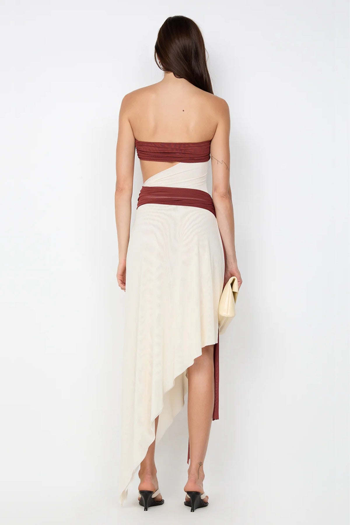 Ayla Strapless Dress by Bec and Bridge — a rust and butter cream spliced strapless dress with a marble ring cutout, perfect for evening events.