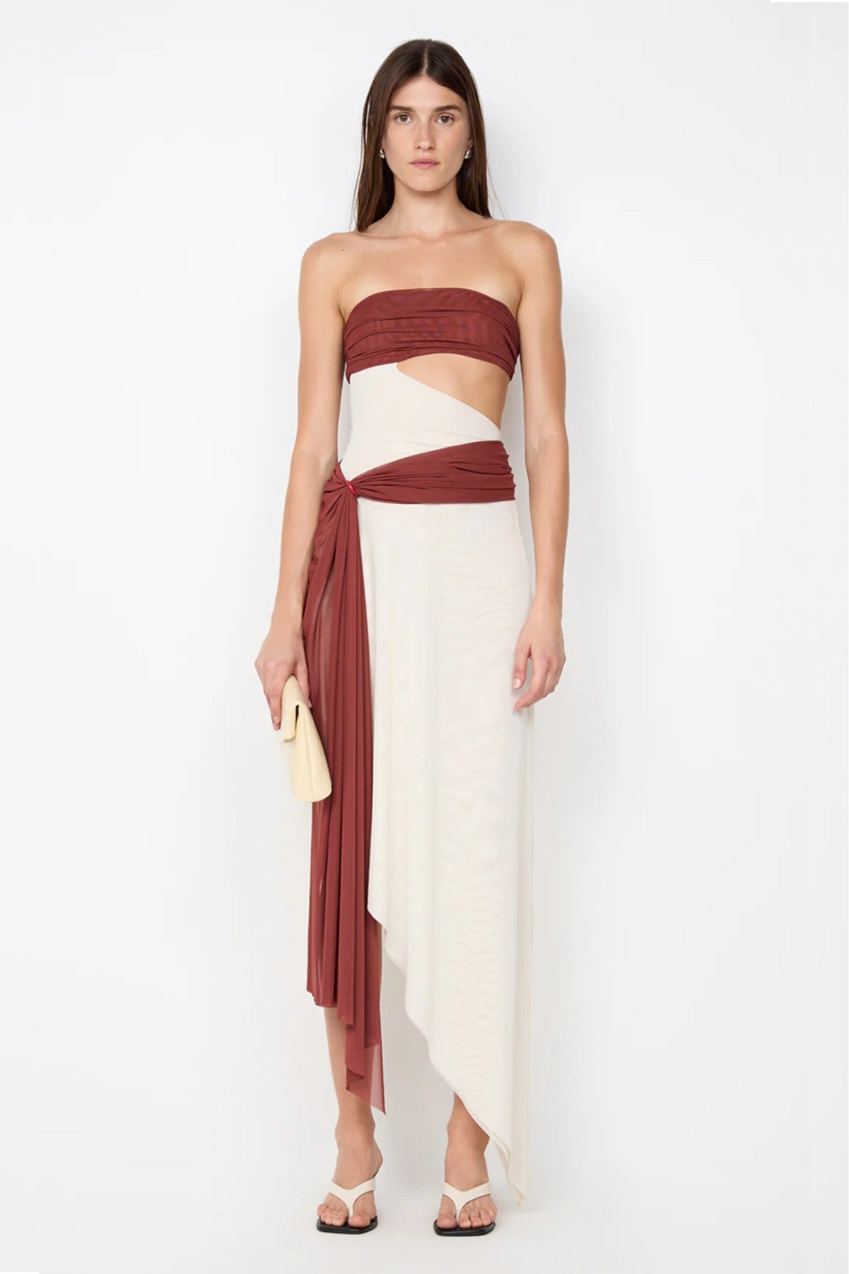 Ayla Strapless Dress by Bec and Bridge — a rust and butter cream spliced strapless dress with a marble ring cutout, perfect for evening events.