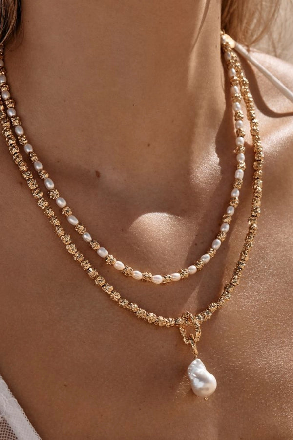 Azar Necklace by Amber Sceats - gold necklace with freshwater pearl pendant and chain links, designed for elevated statement styling.