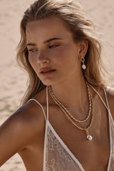 Azar Necklace by Amber Sceats - gold necklace with freshwater pearl pendant and chain links, designed for elevated statement styling.