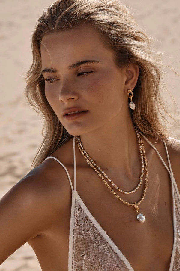 Azar Necklace by Amber Sceats - gold necklace with freshwater pearl pendant and chain links, designed for elevated statement styling.