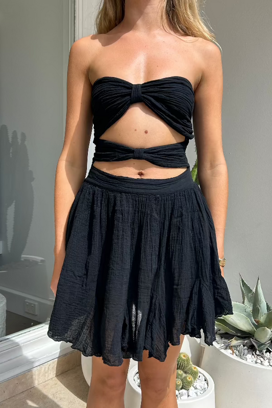 Mia Mini Dress Black by D'Artemide – A cotton mini with alluring cutouts, handmade in Athens for timeless boho elegance.