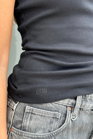 Sophie Tank Black by Sneaky Link – A trendy, soft cotton blend tank with delicate straps and flattering neckline, perfect for layering year-round with effortless style.