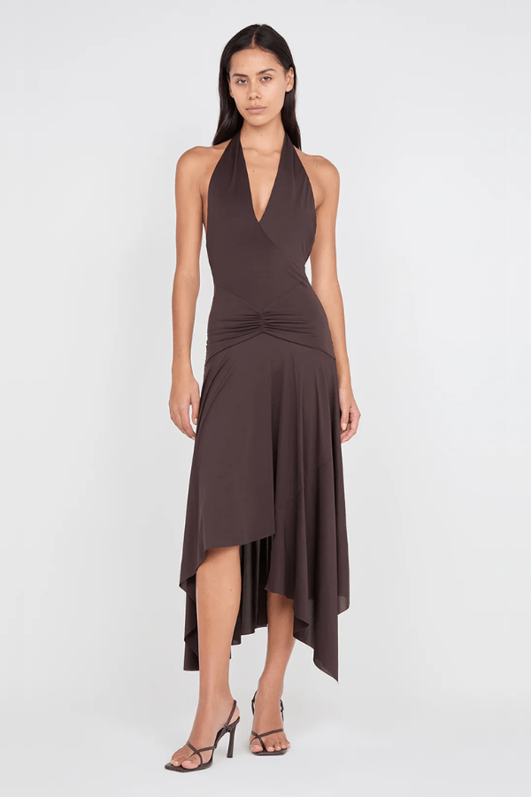 Nessie Halter Dress Dark Chocolate by BEC + BRIDGE – A plunging halter midi in stretch jersey with low back and asymmetrical hem for modern elegance.