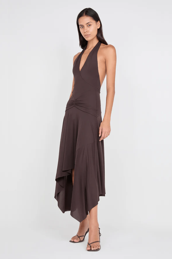 Nessie Halter Dress Dark Chocolate by BEC + BRIDGE – A plunging halter midi in stretch jersey with low back and asymmetrical hem for modern elegance.