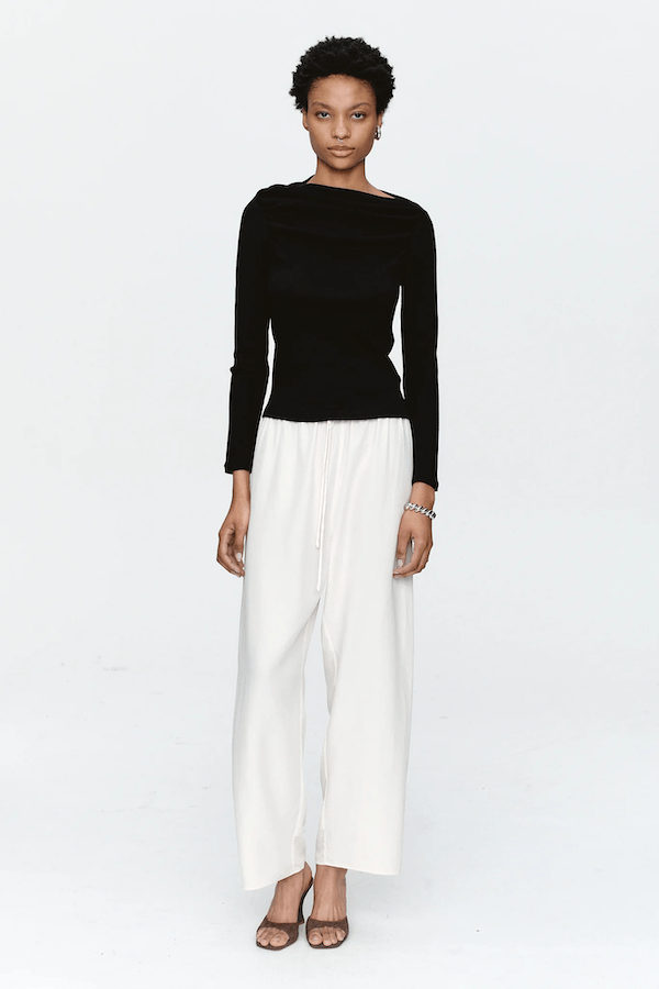 Bryn Top Black by Marle, close-fitting 100% merino wool with soft ribbed texture and gathered boat neckline, perfect for trendy viral layering and elegant everyday wear.