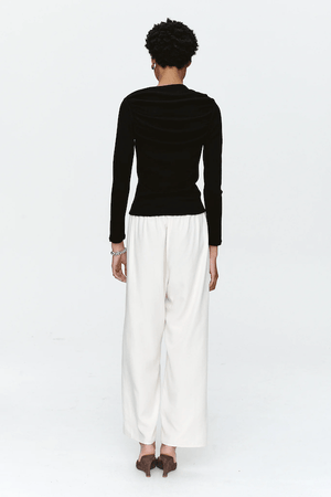 Bryn Top Black by Marle, close-fitting 100% merino wool with soft ribbed texture and gathered boat neckline, perfect for trendy viral layering and elegant everyday wear.