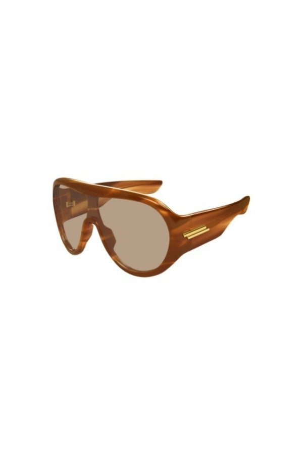 BV1345S007 Havana by Bottega Veneta – oversized shield sunglasses with bold frame and ribbon detail. Perfect for styling.
