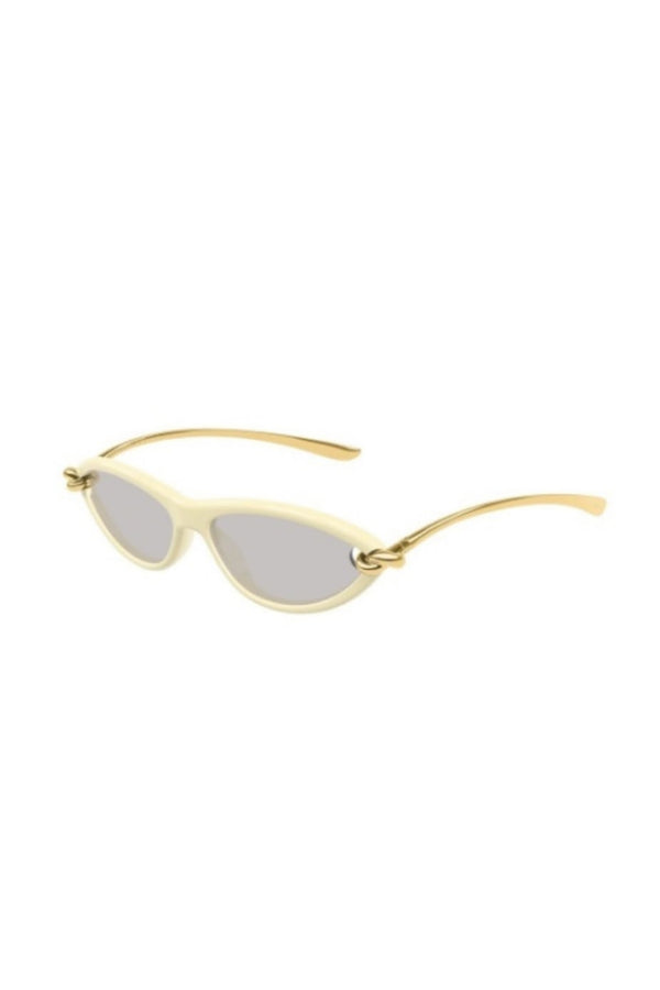 BV1390S007 Beige by Bottega Veneta – cat eye sunglasses with knot detail and soft almond shape. Perfect for everyday styling.