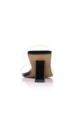 Bambi Wedge in Black Patent Leather by Lana Wilkinson, a sculptural mule with clear straps, 6.5cm wedge, and square toe for modern minimalism.