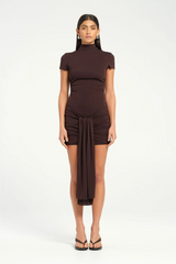 Astrid Mini Dress Chocolate by Benni, figure-skimming design with side ruching, center-front sash, and high-stretch jersey for a flattering fit.