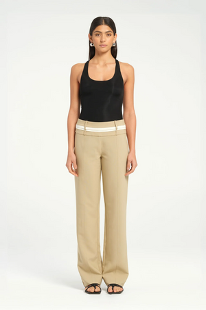 Jade Bodysuit Black by Benni, sleek and minimal with high-stretch jersey, racerback design, and snap closures for a seamless fit.