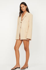 Lyon Jacket by Bec + Bridge, an oversized faux suede blazer in nougat with a single-breasted design and welt pockets for versatile styling.