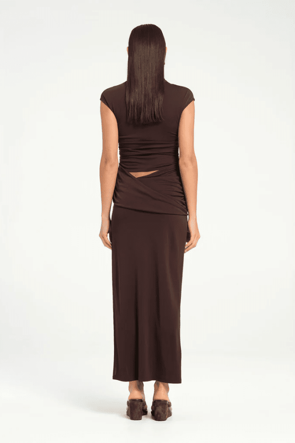 Royce Maxi Dress Aqua by Bec + Bridge, a sleek silhouette with twisted waist detail, subtle cut-outs, cowl waist, and side split for modern evening elegance.