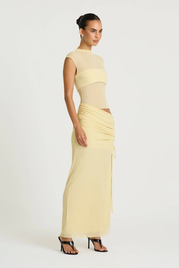Becker Maxi Dress in Lemon Cream by Benni, a stretch mesh maxi with cap sleeves, contrast bust panel, and adjustable side split.