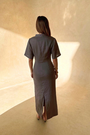Belle Midi Dress in Steel by Sneaky Link, crafted from breathable linen with ruched shaping and arm coverage. Perfect for warm-weather elegance.
