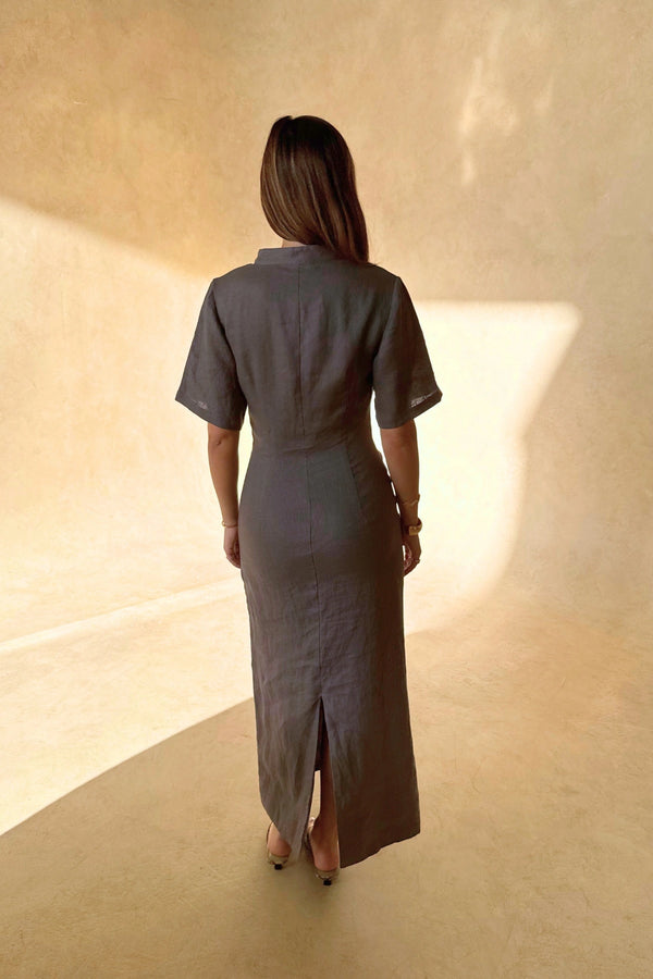 Belle Midi Dress in Steel by Sneaky Link, crafted from breathable linen with ruched shaping and arm coverage. Perfect for warm-weather elegance.
