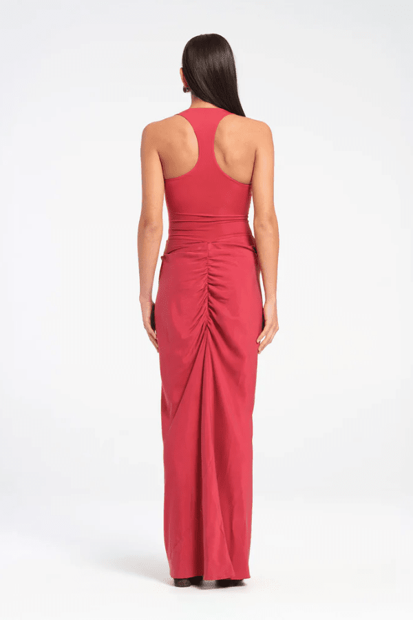 Jade Dress Scarlet by Benni, a sculptural silhouette with a slim-fit bodysuit, fluid skirt, cowl waist, and gathered back for bold, feminine energy.