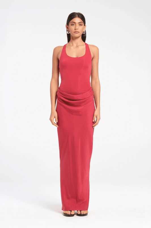 Jade Dress Scarlet by Benni, a sculptural silhouette with a slim-fit bodysuit, fluid skirt, cowl waist, and gathered back for bold, feminine energy.