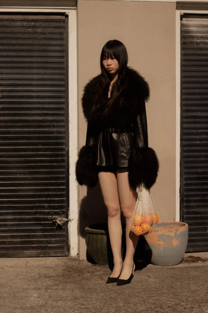 Betty Leather Jacket Black by Ppeached - lamb leather jacket with shearling collar and belt, designed for a refined statement look.