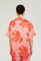 Big Shirt in Peach Petals by Summi Summi, a silky button-up shirt with a hand-painted floral print and relaxed fit.