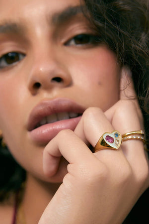 Bisou Heart Ring by Arms of Eve, a 14k gold PVD heart signet ring with cubic zirconia detailing.