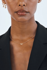 Bisous Necklace in Gold by Avant Studio, gold chain with lips charm detail. Perfect for everyday wear or a playful gift.