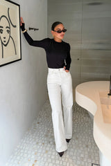 Black Yianni Layered Long Sleeve Top with a fitted silhouette and subtle layered detailing on the sleeves