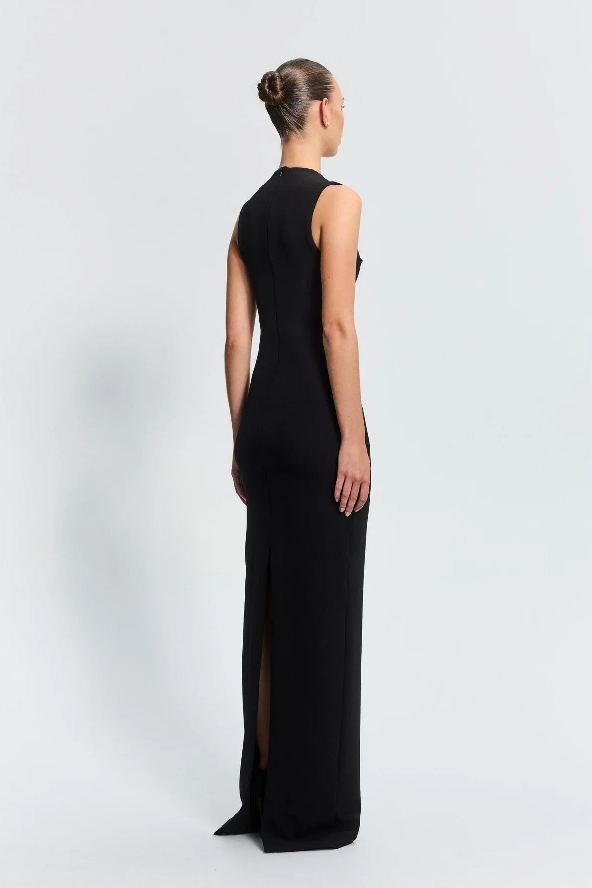 Bloom Gown Black by Effie Kats – sculpted neckline and fitted silhouette in stretch crepe, perfect for modern garden or evening events.
