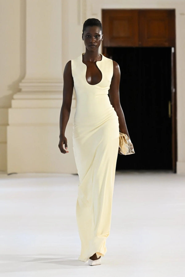Bloom Gown in Lemon by Effie Kats – sculpted neckline and fitted silhouette in stretch crepe, perfect for modern garden or evening events.