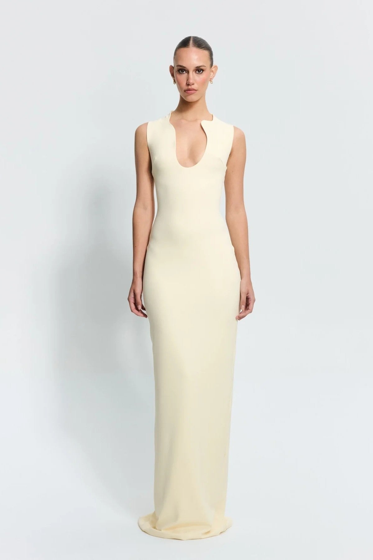 Bloom Gown in Lemon by Effie Kats – sculpted neckline and fitted silhouette in stretch crepe, perfect for modern garden or evening events.