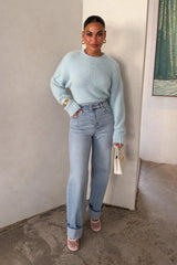 Blue Kaia crew neck sweater with long sleeves and a relaxed fit.