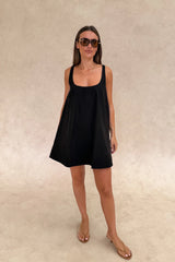 Boston Mini Dress Black by Sneaky Link – a lightweight cotton poplin mini with easy fit. Perfect for effortless summer styling.