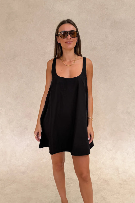 Boston Mini Dress Black by Sneaky Link – a lightweight cotton poplin mini with easy fit. Perfect for effortless summer styling.