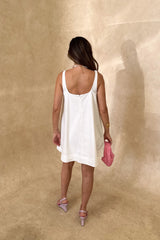 Boston Mini Dress White by Sneaky Link – a lightweight cotton mini with easy fit. Perfect for effortless summer styling.