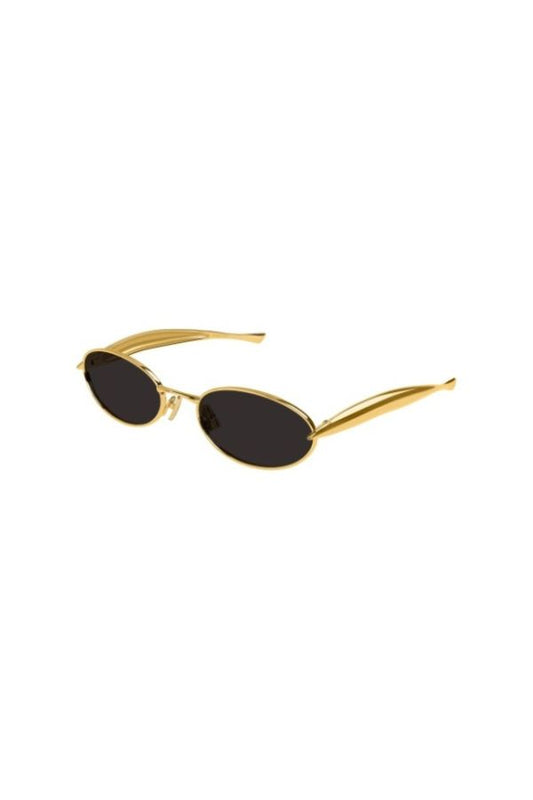 Bottega Veneta BV1386S sunglasses, oval gold frame with sardine-patterned temples and grey lenses. A playful yet chic statement piece.