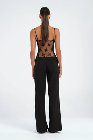 Braxton Saddle Pant Black by Benni - tailored slim fit pants with panel detail and leg splits, designed for a clean modern silhouette.