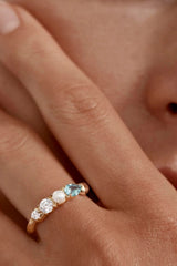 Breathe in Stillness Ring by By Charlotte – 18k gold vermeil ring with freshwater pearls and mint green gemstone accents.