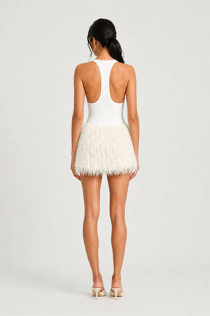 Bronte Mini Dress Ivory by Benni – jersey bodysuit mini dress with racerback and textured shaggy fringe skirt.