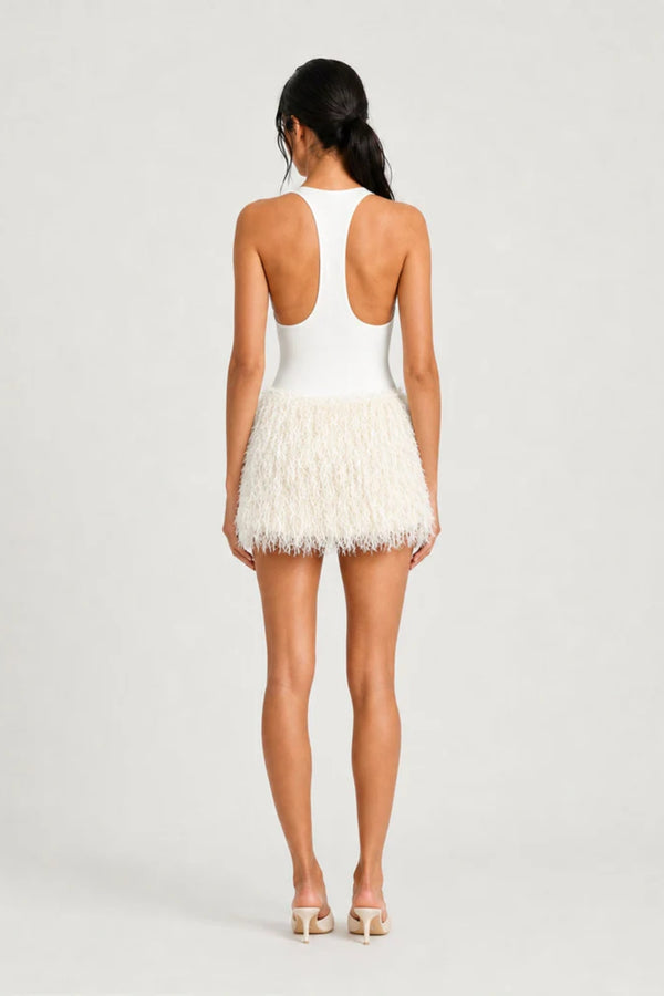 Bronte Mini Dress Ivory by Benni – jersey bodysuit mini dress with racerback and textured shaggy fringe skirt.