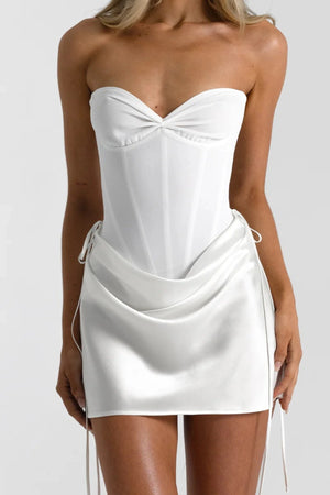 Bronte Top in White by Natalie Rolt, a ruched halter with lace-up back and curved bust. Perfect for elevated pairings or events.