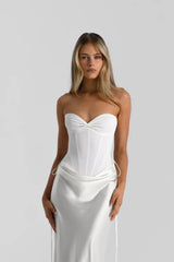 Bronte Top in White by Natalie Rolt, a ruched halter with lace-up back and curved bust. Perfect for elevated pairings or events.