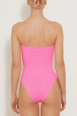Brooke Swim Bubblegum by Hunza G, strapless crinkle swimsuit with ruched neckline. Perfect for beach days or minimal glam swim looks.