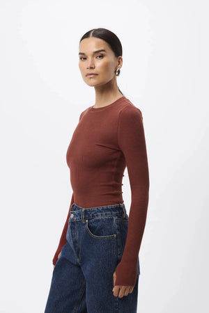 Brooklyn Top Rust by Mossman - ribbed jersey top with thumbhole sleeves and fitted shape, designed for elevated everyday styling.