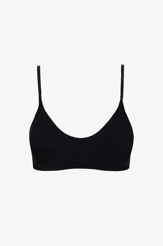 Butter Bralette in Black by Commando, ultra-soft Austrian modal blend with adjustable straps, bust shirring, and lined front for all-day wireless comfort.
