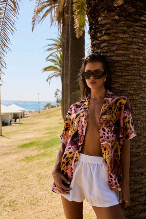 Button Up Short Sleeve Shirt Orchid by Summi Summi – relaxed cupro blend resort shirt with vibrant floral-inspired print.