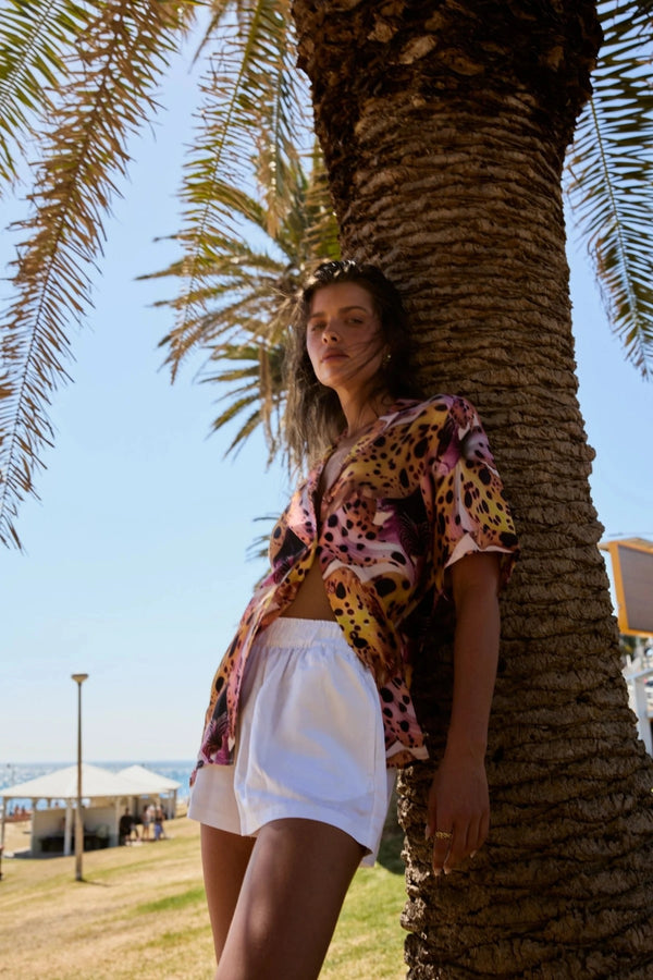 Button Up Short Sleeve Shirt Orchid by Summi Summi – relaxed cupro blend resort shirt with vibrant floral-inspired print.