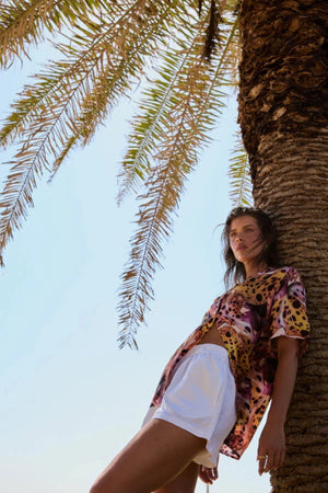 Button Up Short Sleeve Shirt Orchid by Summi Summi – relaxed cupro blend resort shirt with vibrant floral-inspired print.