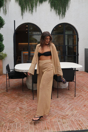 Lumiere Pants Gold by Oséree, sleek straight-fit pants with a metallic shine, perfect for adding luxury to your day or night outfits.