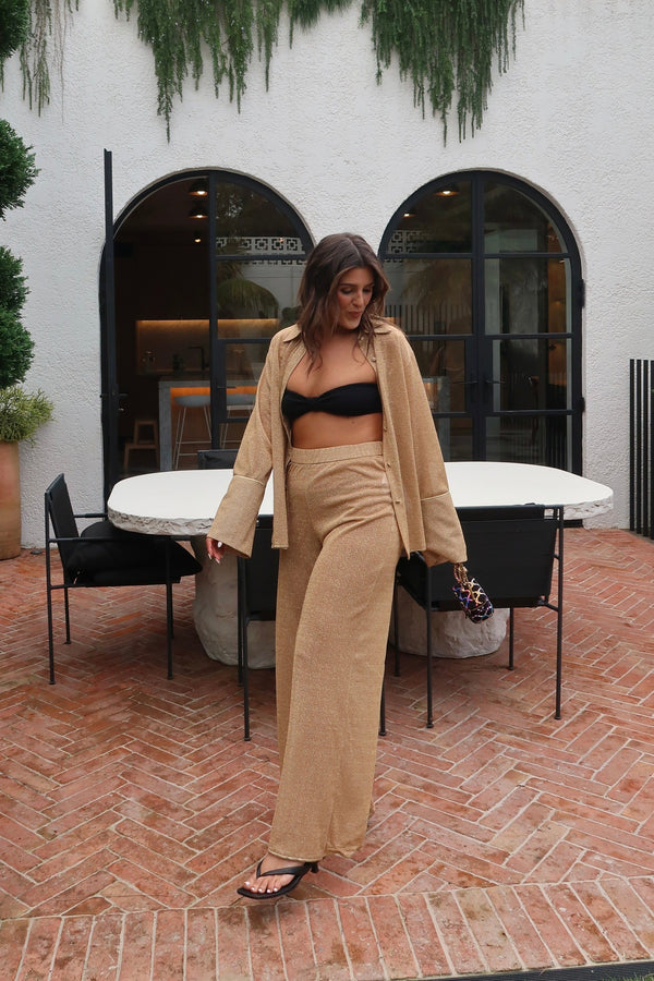 Lumiere Pants Gold by Oséree, sleek straight-fit pants with a metallic shine, perfect for adding luxury to your day or night outfits.